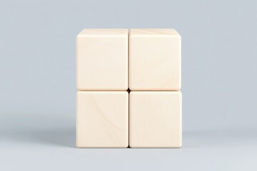 Obraz premium Four connected light beige wooden blocks