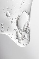Hyaluronic gel with bubbles, transparent cosmetic solution macro.