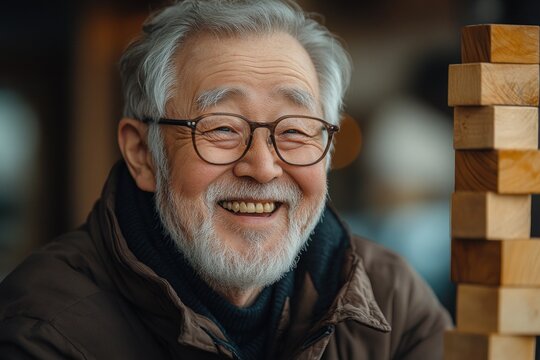 Elderly Happy Group Playing Jenga Together in Warm Indoor Setting