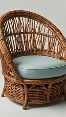 Fototapeta premium Wicker Chair with Light Blue Cushion: Rattan Seating