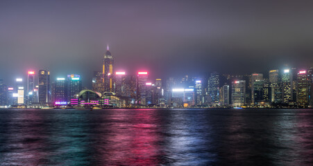 Obraz premium A long exposure night view of Hong Kong island Wan Chai district city skyline.