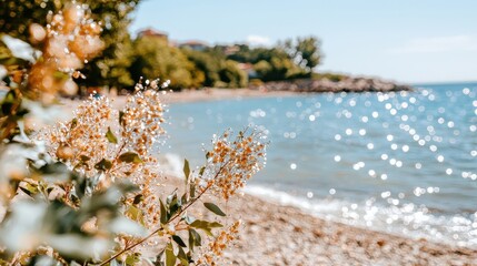 Fototapeta premium Serene Coastal View with Sparkling Water and Blooming Flowers on a Sunny Day
