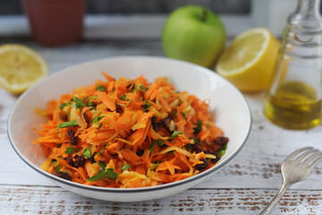 A bowl with traditional Polish carrot salad  © nastyakamysheva