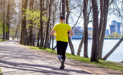 A man Jogging in a summer Park
