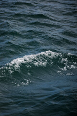 Wave texture with dark sea water. Nature texture. Abstract background.