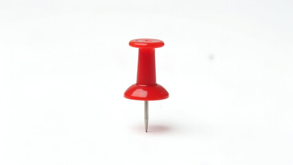 A Solitary Bright Fire Engine Red Pushpin Standing Upright on a Clean White Surface