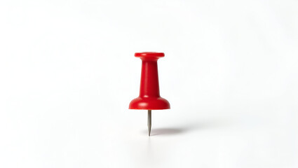 A Solitary Bright Fire Engine Red Pushpin Standing Upright on a Clean White Surface