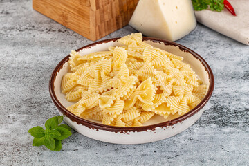 Italian pasta Farfalle with oil