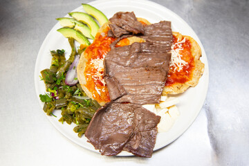 Beef jerky barbacoa is the traditional dish of Atlixco in the Puebla region of Mexico.
