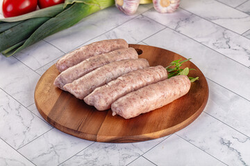 Raw pork sausages for grill