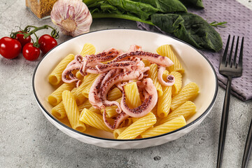 Italian cuisine - pasta tortiglioni with squid