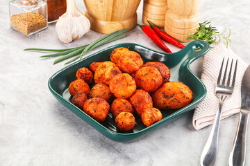 Baked young potato with paprika