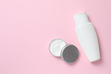 Natural cosmetic products a pink background, top view