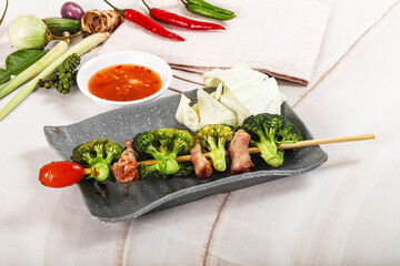 Thai Street foof satay with bacon and broccoli