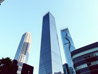 Naklejka premium Corporate office buildings towers skyscrapers low angle