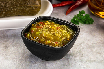 Souce gherkin relish with marinated cucumbers