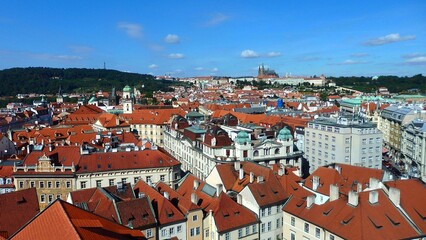 Obraz premium View of the city of Prague and old town square with buildings and St. Nicholas church seen from the Old Town Hall (Staromestska Radnice)