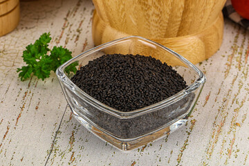 Black dry Nigella seeds in the bowl