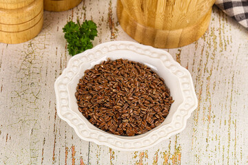 Brown flax seeds in the bowl