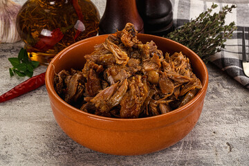 Shredded slow cooked pork meat