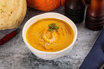 Pumpkin cream soup with prawns
