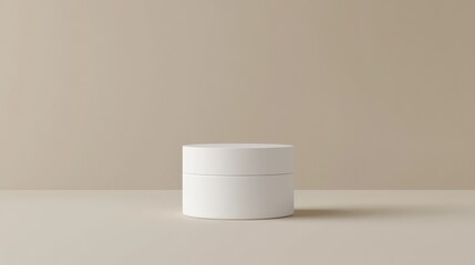 A plain, cylindrical product container with smooth edges, placed on a soft background, offering space for custom branding.