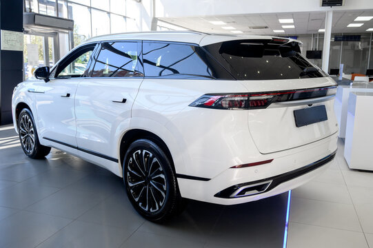 Astrakhan, Russia - November 8, 2024: Brand new white Jaecoo J8 crossover in the showroom