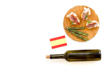 Prosciutto with rosemary and glass of wine. Traditional Spanish meal