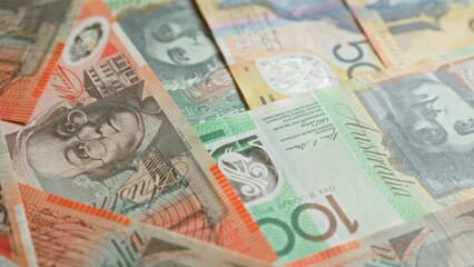 Australian banknotes featuring various denominations of colorful currency showcasing the unique...