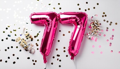 Pink balloon number 77 for seventy-seventh birthday or anniversary party. White background with confetti