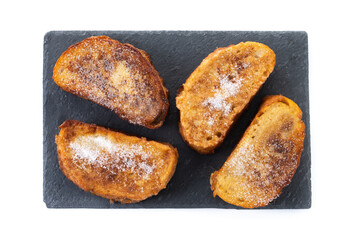 Traditional Spanish torrijas for Holy Week isolated on white background