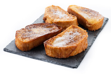 Traditional Spanish torrijas for Holy Week isolated on white background