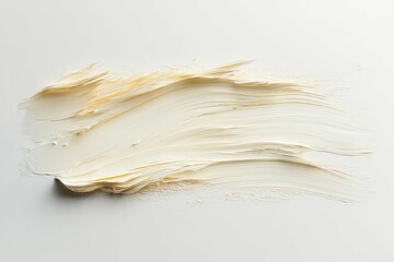 Creamy Beige Brushstroke Texture Against a Simple White Backdrop