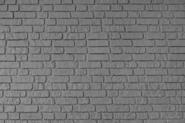 Gray color painted old brick wall texture, architecture brickwork building, masonry of stone blocks structure. Design element, wallpaper, horizontal background, banner, header.