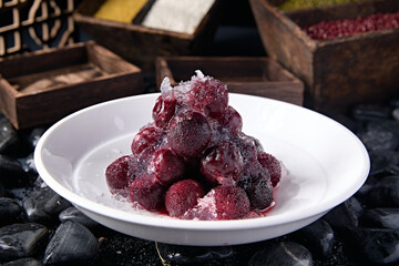Ice-cold snow clam and bayberry in syrup