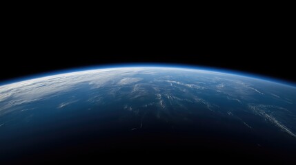 Earth from space, a breathtaking view of our planet's curvature.  Clouds, oceans, and landmasses are visible, highlighting the beauty and fragility of our world from afar