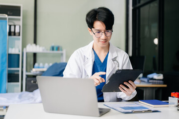 Doctor analyzing patient data on tablet in clinical lab. Medical professional in hospital with...