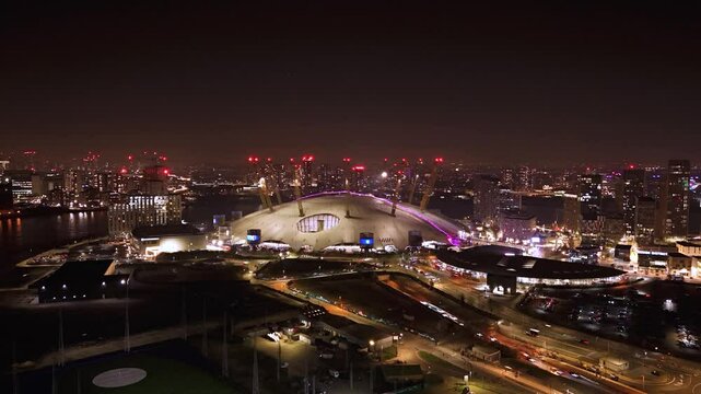 Drone hyperlapse of the O2 Arena in Greenwich area of London at night