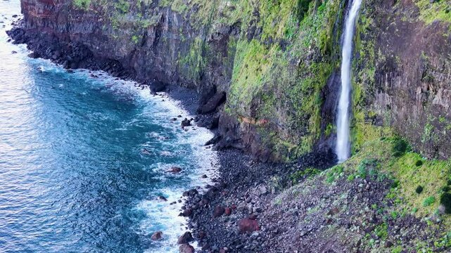 Close Up Drone View of Veu da Noiva Waterfall and the Old Road Leading to Seixal City, Madeira Island
