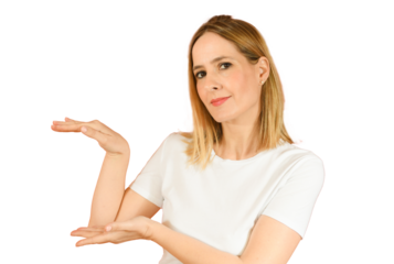 Woman smiles surprise showing product over transparent background. PNG transparent