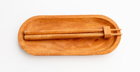 Balanced Form: Wooden Stick in Sleek Holder on White Base