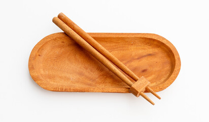 A sleek and minimalist presentation of wooden chopsticks on their holder, perfect for table setting and culinary branding.

