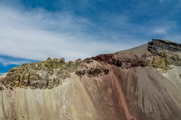 Volcanic desert landscape of Andes mountains in South America. High mountain summit in the middle of desert high altitude altiplano, volcano El Misti crater near Arequipa city in Peru. Volcanic land