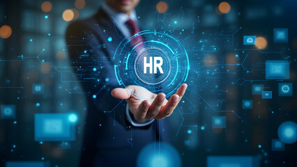 Business professional in a suit interacting with a digital interface and holographic HR icon, showcasing innovative human resources and digital transformation in a futuristic corporate environment.
