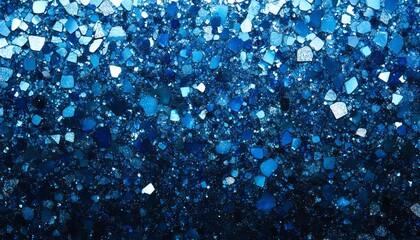 Sparkling Blue Glitter Texture Background with Scattered Fragments and Shimmer