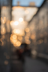 Defocused lights in the city. Golden time in evening.