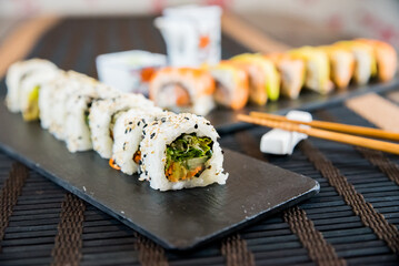 Fresh Sushi Rolls with Sesame Seeds and Vegetables
