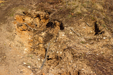 Sandy slope eroded by water, soil erosion