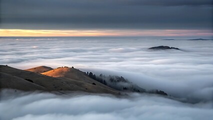 Mountaintop Above Fog Bank at Sunset