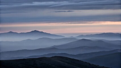Obraz premium Misty Mountain Range at Dawn